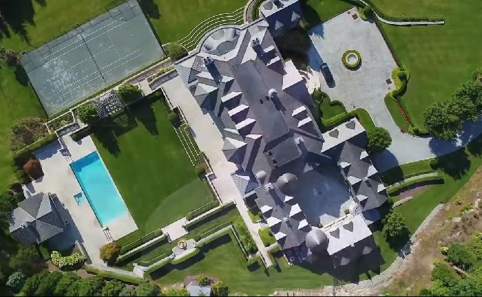 NFL player mansion surrounded by water
